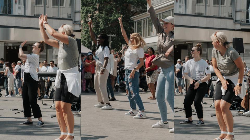 Menschen bei einem gemeinsamen Tanz im Freien